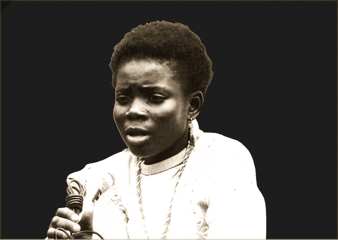 Queen Salawa Abeni as a teenager at the microphone, in a sepia portrait from her debut years